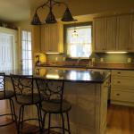 Kitchen Island. 1 of 2 sinks under window.