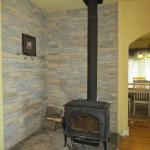 WOOD BURNING STOVE IN KITCHEN